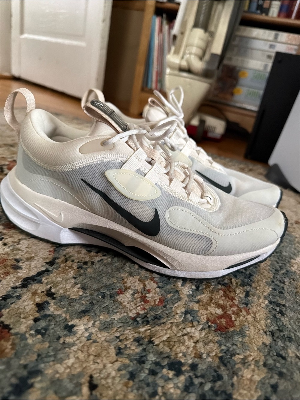 Nike Women’s White Cream Athletic Sneakers with Black Swoosh